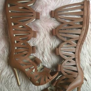 Thigh-high caged Guess pumps